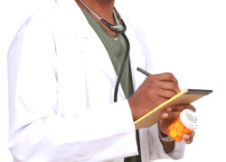 pharmacist holding pen and paper