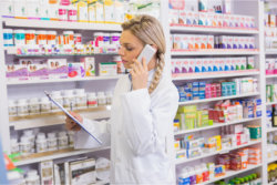 pharmacist checking the products